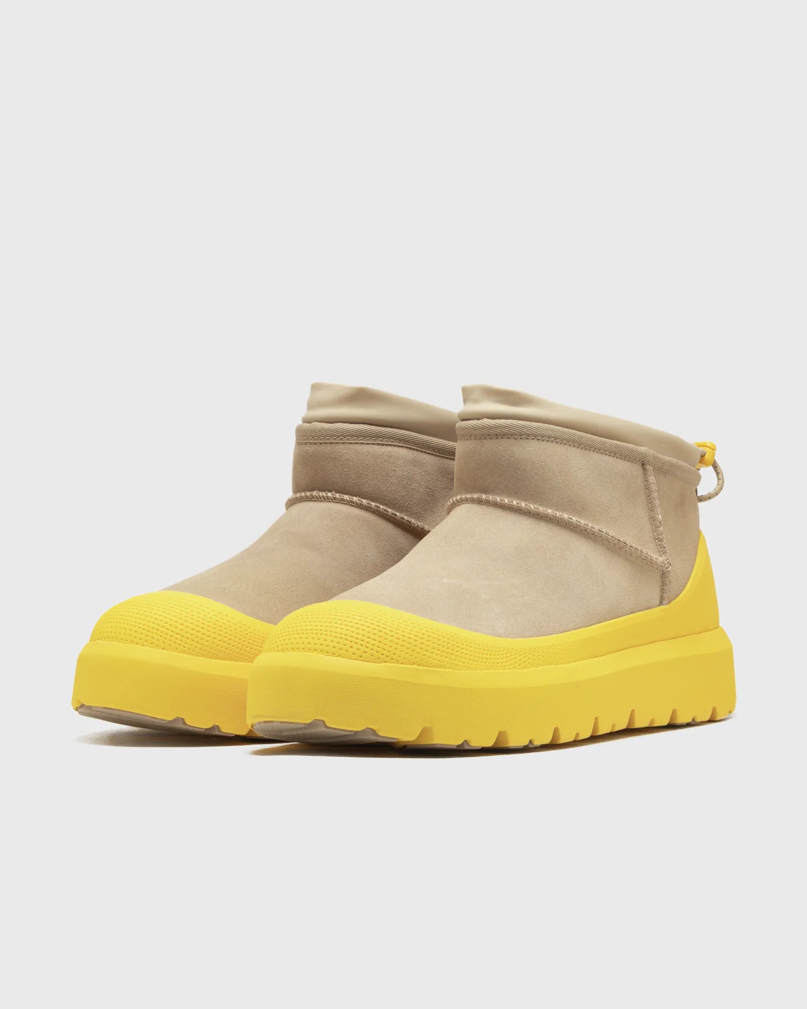 Lioran botki zimowe w kolorze beżowo-żółtym – modne buty z kontrastową podeszwą 