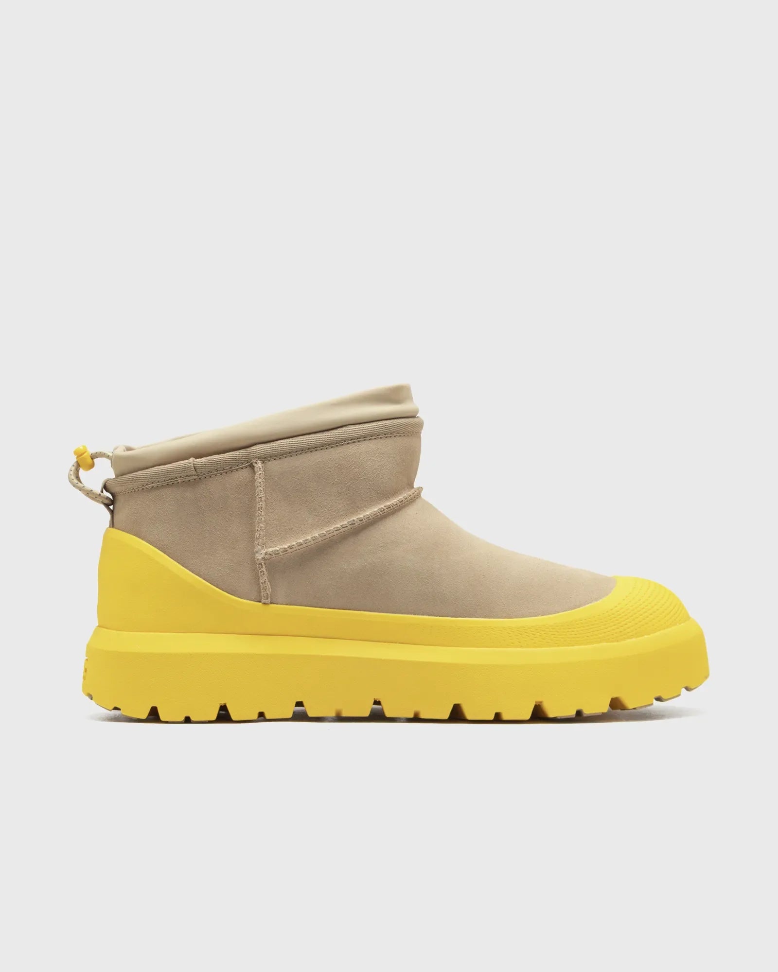 Lioran botki zimowe w kolorze beżowo-żółtym – modne buty z kontrastową podeszwą 